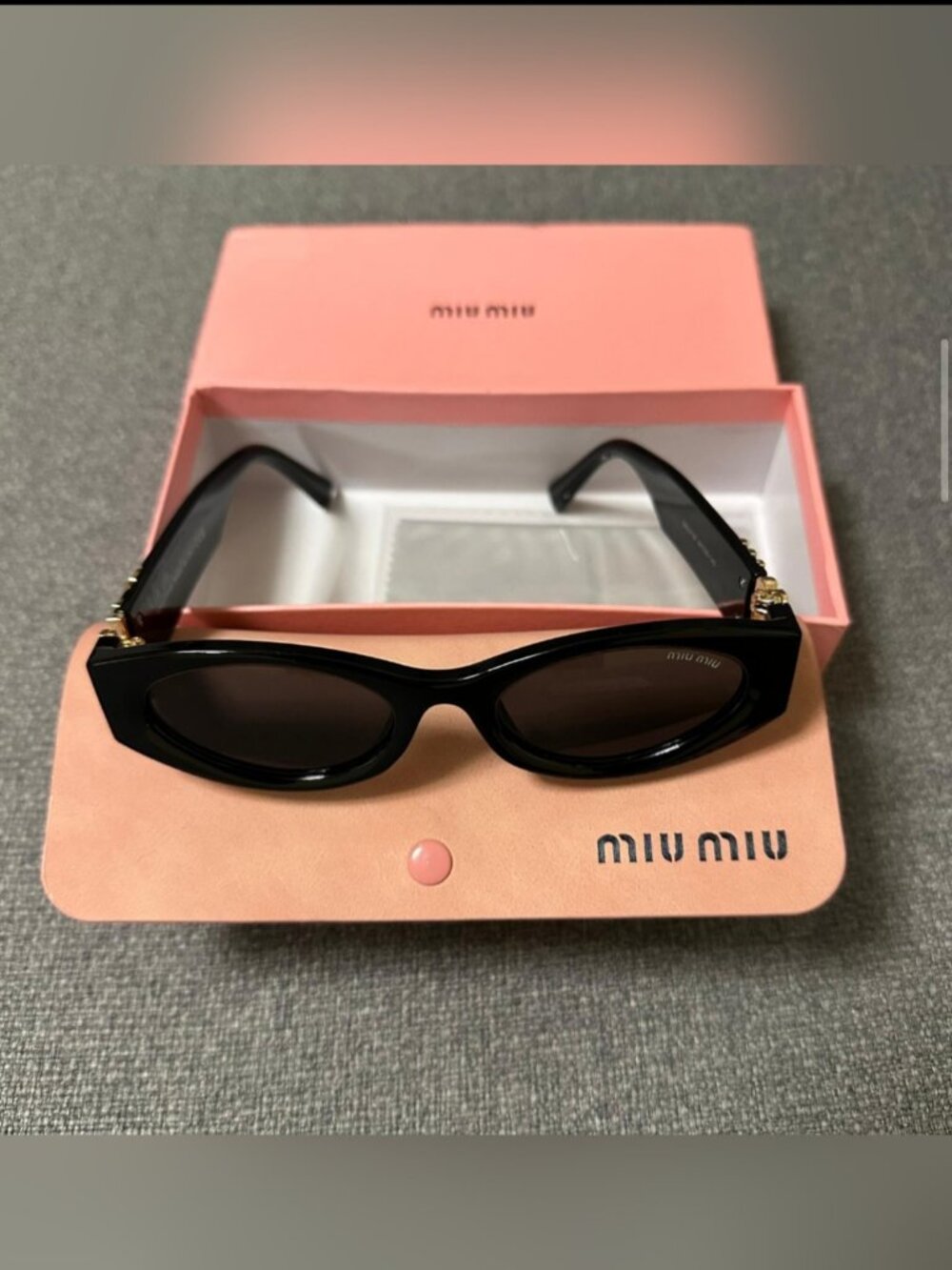 Miu Miu Women's Black Cat-Eye Sunglasses